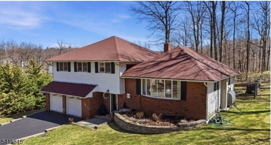 Welcome to this beautifully maintained four-bedroom split-level home located in the sought-after Barry Lakes community of Vernon Township. Surrounded by the natural beauty of Wawayanda State Park, this home offers a rare blend of privacy, recreation, and year-round scenic living. Residents enjoy traveling into the community along two picturesque access roads that wind through preserved state land, creating a peaceful and uniquely natural arrival home each day. Ownership includes membership privileges to Barry Lakes, with access to two large freshwater lakes whose shorelines border protected park property, offering swimming, kayaking, fishing, and stunning seasonal landscapes. Inside, the home provides spacious living areas, three full bathrooms, an eat-in kitchen, a large family room with fireplace, and flexible space ideal for a home office or guest accommodations. The attached two-car garage, ample storage, and well-maintained exterior add to the home?s comfort and convenience. Located just minutes from Mountain Creek Resort, public golf courses, hiking trails, and Vernon?s outdoor attractions, this property delivers the perfect combination of lifestyle, adventure, and tranquility in one of Sussex County?s most scenic settings.