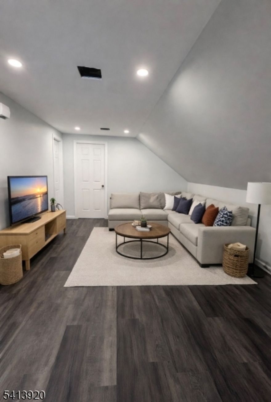 Completely remodeled with today's modern finishes and truly move-in ready! This stunning second-floor apartment offers 2 bedrooms and 1 full bath, featuring stainless steel appliances, recessed lighting, and the convenience of an in-unit washer and dryer. A versatile bonus flex room provides the perfect extra space. Enjoy central air and an unbeatable location just minutes from major highways and public transportation.