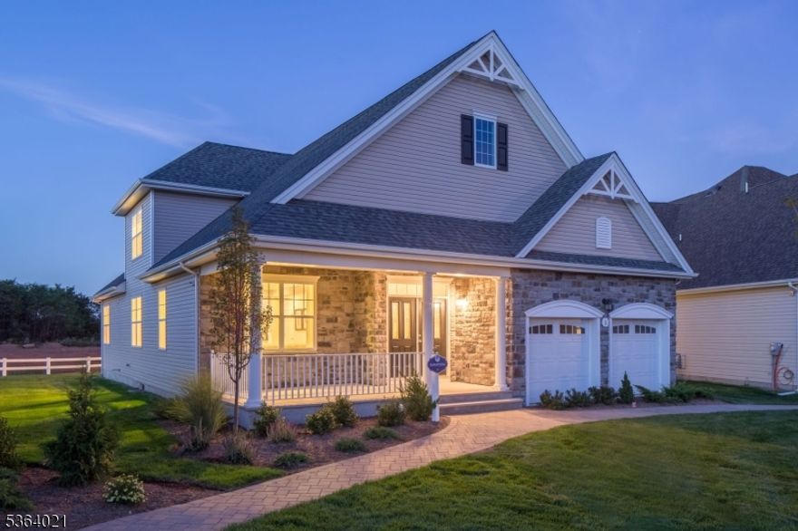 GATEWAY AT ROYCE BROOK ACTIVE ADULT - RARE OPPORTUNITY - BUILDERS DECORATED MODEL NOW AVAILABLE! The beautifully decorated SARATOGA MODEL HOME can now be yours. This timeless home features a first floor Primary Suite with tray ceiling, en suite bath and walk-in closets. Dramatic 2 story Family Room w Gas FP , Elegant Kitchen with SS appliances, breakfast bar and sunny Breakfast area which leads to the paver patio. Living/Dining Room, Guest Room suite with Bath & walk-in closet. 2nd floor has a great Loft space - perfect for home office or Guest retreat. Bedroom and Full Bath completes the second level. FULL BASEMENT. Professionally decorated by the award winning Childs Dreyfus Group. This Model home is being sold AS IS - including all furnishings, window treatments, appliances and custom built-ins as shown. 2 car attached Garage. 10 YEAR BLDRS WARRANTY. Magnificent Clubhouse w so much to offer incl. Fitness Center, Yoga Studio, Billiards, Ballroom, Library, Crafts, Cards & Games. Tennis/Pickleball, bocce, horseshoes and shuffleboard. Clubs and community events & activities for all interests. Gated. Gateway at Royce Brook is nearly Sold Out - Don't miss this rare opportunity. No more snow shoveling and lawn mowing. Relax & Enjoy!