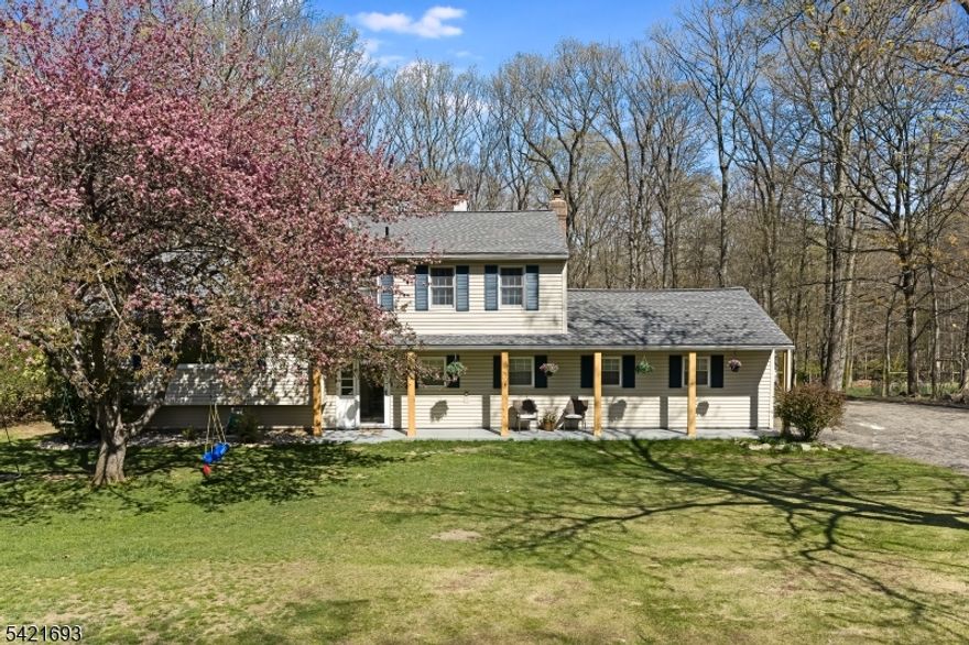 Situated at the end of a quiet cul-de-sac, this residence offers a private and serene setting on a beautiful wooded lot. This home features a functional layout designed for both everyday life and effortless entertaining. The heart of the home is an updated kitchen boasting modern finishes that blend style with utility. Surrounded by nature yet thoughtfully maintained, this property provides a peaceful retreat while remaining close to local conveniences.The interior design emphasizes flow and light, ensuring every room feels connected and purposeful. The primary living areas transition smoothly into the renovated kitchen, where contemporary upgrades create an inviting atmosphere for meal preparation and social gatherings. Large windows throughout the house invite the outdoors in, highlighting the lush greenery that encircles the premises. Each of the four bedrooms provides ample space and versatility, accommodating various needs for rest or productivity.Outdoor living is a primary draw of this location, as the expansive wooded lot serves as a natural backdrop for relaxation. The position at the terminus of a dead-end street minimizes through traffic, enhancing the quiet atmosphere of the neighborhood. With its blend of updated interior elements and a tranquil exterior environment, this home stands as a refined example of comfortable suburban living. The balance of modern amenities and a secluded landscape makes it a standout choice for those seeking quality and calm.