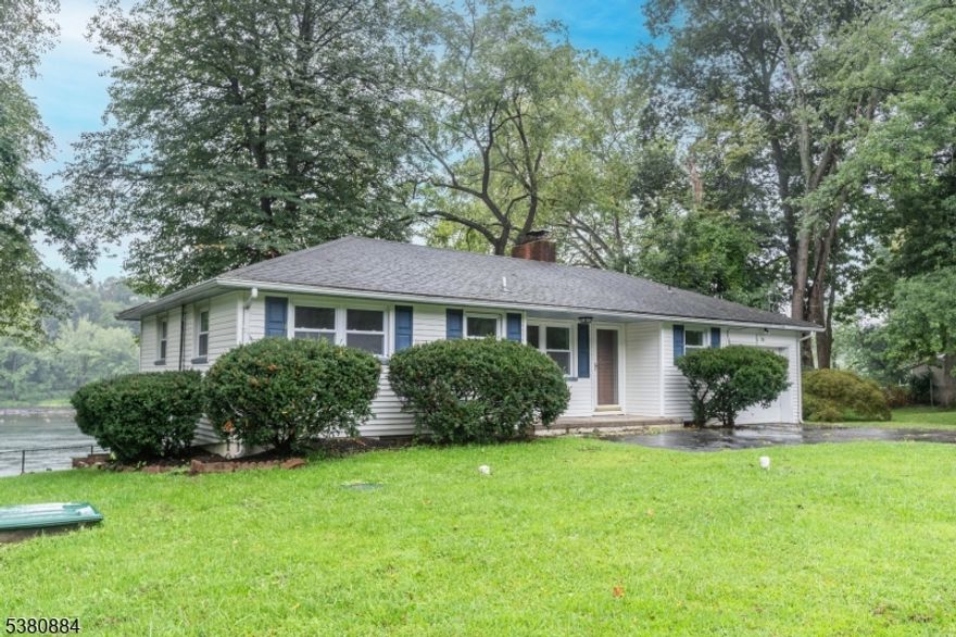 Riverfront Ranch overlooking the Delaware River. This Home has all new windows and freshly painted walls with new trim and interior doors . Glistening refinished oak  hardwood floors that give this home a bright airy feel . Home features 3 bedrooms,new kitchen and bath with a large stone fireplace in the Living Room.Nice level lot with great parking .Breakfast room off of kitchen has picture window that overlooks river. Laundry hookups in breakfast room. Home offers new ECO FLOW septic system. Best of all large full walkout basement to large patio and deck overlooking the Delaware River. Basement has plumbing for second  bathroom in the slab that is connected to the new septic system. A second fireplace in the walk out basement with windows and view of the river.. Basement is is large enough  for an additional bedroom , Great Room , bathroom and more.