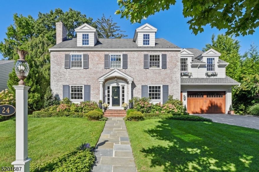 Manifest your best life: East Hampton meets Montclair and it's all about lifestyle at this Fairway neighborhood gem. Impeccable design & use of space from top to bottom creating a flawless combination of craftsmanship & "gotta-have's  with a fabulous heated salt water pool out back! Warm & welcoming center Entry Hall. Formal Living Room with wood burning fireplace, built-ins & French doors. The bright, formal Dining Room will be the backdrop for amazing memories but the hub of activity will surely be the stunning Kitchen & Family Room space out back then leading you blissfully outdoors. Coffered ceiling, expansive windows, high end appliances (several in duplicate), magnificent stone countertops, gas fireplace, the homework center, the laundry room - all beautifully planned so you can live your best life doing the everyday. On the 2nd Floor, restorative primary ensuite you'll swoon over with vaulted ceiling, gas fireplace, reading nook, spa Bath & walk in closets. 4 additional bedrooms & 2 baths. 3rd floor perfect for all kinds things! Finished lower level with wine room, service bar, rec room & gym. Out back, fabulous hardscape with patio, Hampton's style pool & stone fireplace. A most pleasurable oasis, conveniently located between two parks & 13 miles from New York City. A home to give you dreams you didn't know you had.