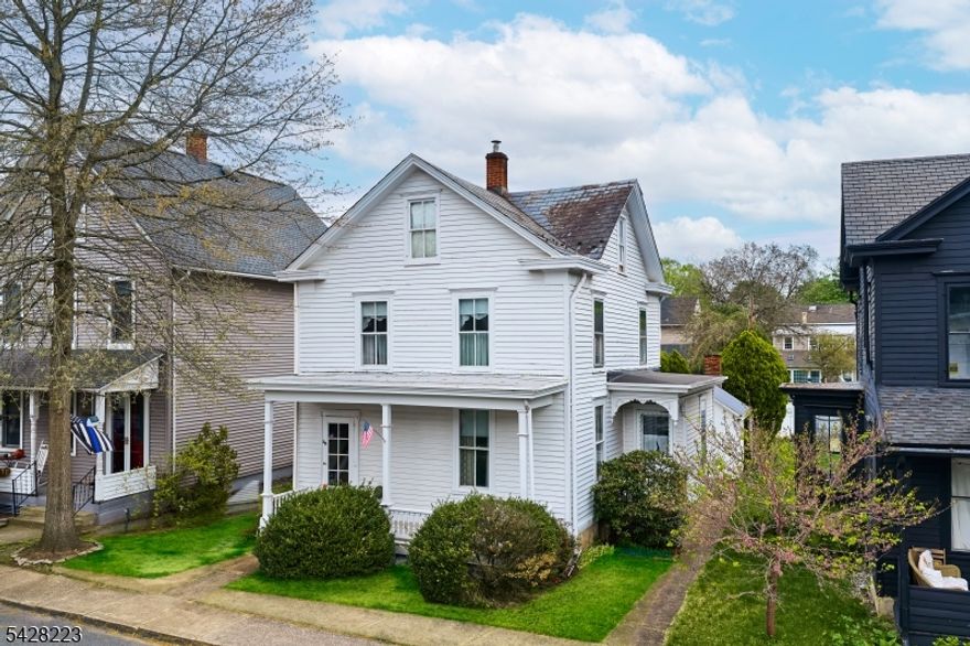 Discover the best of Milford living with easy walking access to both the town center and the scenic banks of the Delaware River, directly across from Bucks County, Pennsylvania. This 3-bedroom Cape Cod offers a rare opportunity to own a character-filled home in a location that blends small-town convenience with natural beauty. Inside, the home showcases original mid-century details throughout, providing a unique canvas to restore its vintage charm or update to suit modern tastes.  Three bedrooms with a practical, inviting layout. Original fixtures and finishes ready for preservation or renovation. Private garden space, garden nook, and old "summer kitchen. Covered rear patio, perfect for quiet mornings or evening gatherings. Quiet, established neighborhood offering a strong sense of place. An ideal opportunity for buyers drawn to charm, walkability, and the timeless appeal of river-town living.
