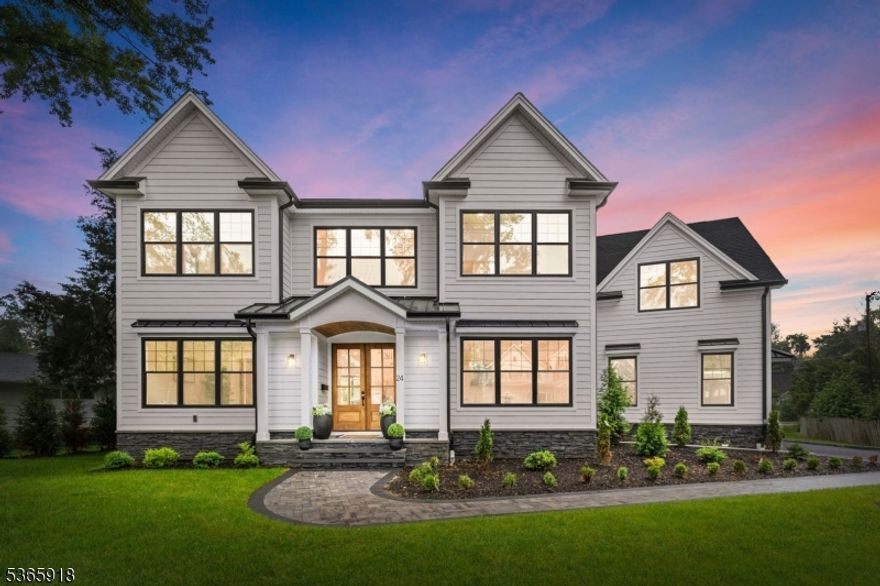 Modern. Rustic. Boho. 24 Rockwood is a soulful blend of style & serenity of beautifully curated living space featuring 6 bed 5.5 bath. This new construction residence captures the essence of elevated design with a thoughtful mix of natural woods, earthy tones, clean architectural lines & soft textures. From the moment you enter the grand two-story foyer with 20 ft soaring ceilings with its white oak staircase, iron balusters, and halo-style chandelier, you're greeted with an effortless balance of minimalism and warmth.The main living space is a statement in contrast & cohesion a striking black fluted fireplace anchors the room, framed by oversized windows, layered greenery, and light-toned wide-plank floors. Sliding glass doors connect the space to the outdoors, while soft neutrals and organic textures create an airy, boho-inspired atmosphere ideal for both relaxation & entertaining.The chef's kitchen features Viking appliances, quartz countertops, & connects to a dramatic butler's pantry & wet bar with matte black cabinetry, brass hardware, & a designer stone backsplash. It's both functional and beautiful perfect for modern-day hosting.Retreat upstairs to the primary suite, a peaceful sanctuary featuring exposed wood beams, vaulted ceilings, & bohemian accents that invite you to unwind. The en-suite bath is spa-like & serene, & the custom walk-in closets offer both space and elegance. The recreation room features a golf simulator.