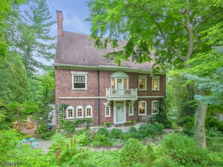 Nestled in the upper Wyoming section of Millburn, Eastover offers a perfect blend of timeless elegance and modern comfort. This historic home exudes character with its well preserved architectural details and picturesque landscaping. Upon entering, you are greeted by a grand foyer featuring a stunning staircase, original hardwood floors and elegant moldings. While preserving its historic integrity, this home has been thoughtfully updated with modern amenities creating comfort and convenience. The chef's kitchen combines classic design elements with state of the art appliances and finishes. The spacious formal dining room offers the perfect setting for hosting and the family room overlooks  the private yard and gardens with its many windows. On the second floor is the primary bedroom with  en suite  bathroom and large walk in closet. There are two additional bedrooms, a full bath and an office. The third floor has two additional bedrooms and a bathroom. This lushly landscaped property is conveniently located near NYC trains, downtown shopping and easy access to highways and airports. The detached garage has a full height second floor accessed by stairs as well as a garage door opener, water and electricity. The top rated Millburn school district is another bonus to this home's many attributes.