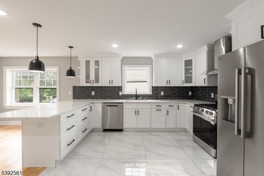 Welcome to this fully renovated, turn-key two-story apartment offering 4 bedrooms, 3 full bathrooms, and high-end finishes throughout. This thoughtfully designed residence features a modern open-concept layout with a stunning kitchen showcasing quartz countertops, tile backsplash and flooring, and brand-new appliances.Enjoy a spacious primary suite with a walk-in closet, and ample storage throughout the home. The finished basement includes private in-unit laundry with a brand-new washer and dryer. Balcony off back entrance, 1 garage parking spot with electric opener, private storage available for an additional fee, Located near top-rated schools, shopping, and public transit, this move-in-ready home offers space, style, and long-term value in a prime location. No smoking and no pets