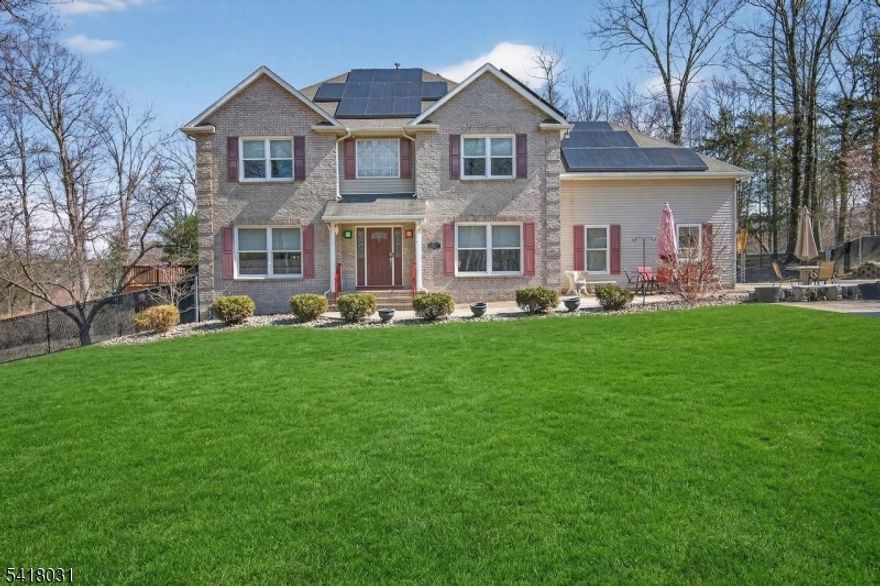 Spacious 4/ 5 BR Colonial in Hidden Valley, Sprawling 3 AC.  level & fenced lot. You are greeted by a large paver stone driveway, Hardwood on 1st floor. 2 Story Foyer & custom lighting. Kitchen features, Center island w/sink, SS Appliances. &  Wine Fridge, Pantry , Maple Cabinets. The family room has a Gas Fireplace, Spacious deck, French doors in the living room. Formal Dining Room. This home has 2 elevators with wheelchair access to all levels.  Primary Bedroom features a tray ceiling, a jetted tub, plus shower and two walk-in closets.Large  Finished office or bedroom over the garage, Water Filtration system.& Softener. The Lower level has a Theater Room which is includes all equipment. Extra guest room or home office.  Half bath in storage room. Generac Generator.