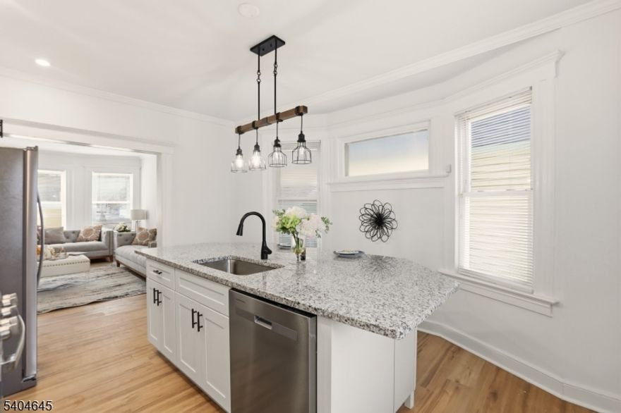 Qualifies for $22K Grant at 5.6% or  a loan with 5.1% and no PMI Seller concession $5000 if closed by 3/31/2025! Renovated Spacious 5-bedroom, 1.5-bath home ideally located just steps from the Glen Ridge border.  This property offers a large, sun-filled living room, a separate dining room, and generously sized bedrooms providing flexible living options.The Brand New Kitchen Features an expansive island and stainless steel appliancesThe full basement features an unfinished half bath, Laundry hookups, and expansive open space perfect for storage or future customization. With solid layout, abundant square footage, and endless potential, this home is ideal for buyers looking for space, beauty, and options. Conveniently located near transportation, shopping, schools, and major commuter routes.A rare opportunity in a sought-after location come make it your home. Qualifies for $22K Grant and a loan with 5.1% no PMI