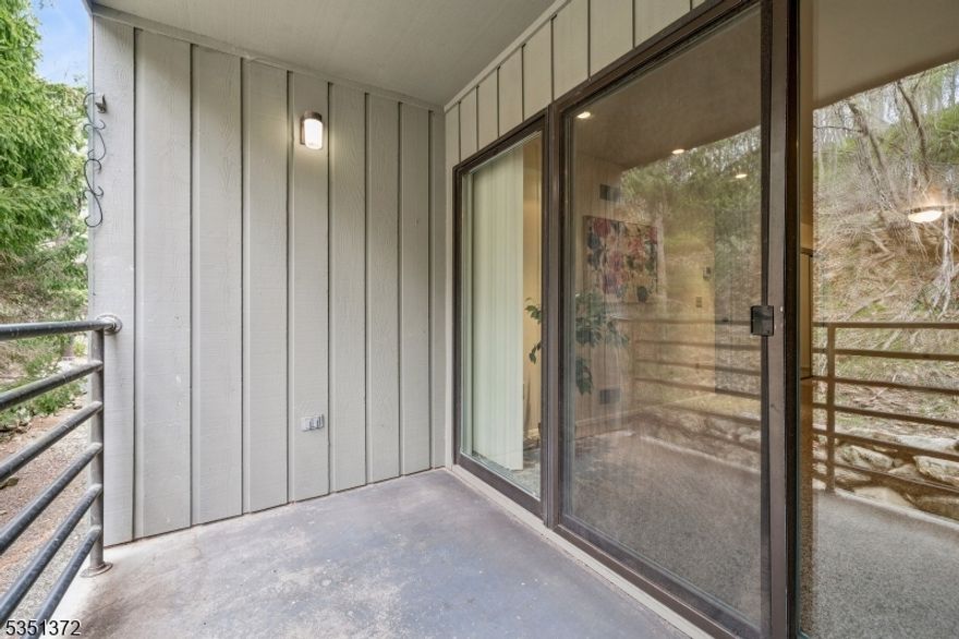 SPACIOUS, BRIGHT AND LIGHT CONDOMINIUM ON 4TH FLOOR IN THE HEART OF MORRISTOWN is waiting for you!!  It features living room, dining room, kitchen with stainless steel appliances, primary bedroom with two closets and full bath, second bedroom, main bathroom, and your private balcony off the living space overlooking greenery.  There is additional storage unit on the 2nd floor.  Building features secure lobby and is equipped with an elevator for your convenience.  Just few blocks from The Green, yet - so private.  Excellent location nearby premier dining, shopping, and entertainment. Come and see