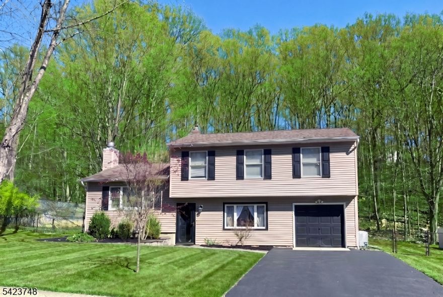 CHARMING 4-BEDROOM SPLIT-LEVEL HOME SET ON NEARLY HALF AN ACRE OF LEVEL PROPERTY. THIS IMMACULATE RESIDENCE FEATURES A CUSTOM KITCHEN WITH GRANITE COUNTERTOPS, TILED BACKSPLASH, AND STAINLESS STEEL APPLIANCES. THE KITCHEN FLOWS INTO A SPACIOUS LIVING ROOM WITH A COZY WOOD-BURNING FIREPLACE AND A DINING AREA OVERLOOKING A LARGE FAMILY ROOM.THE HOME OFFERS A PRIMARY BEDROOM SUITE WITH A FULL BATH, PLUS THREE ADDITIONAL NICELY SIZED BEDROOMS AND 2.5 BATHROOMS.,2ND FLOOR LAUNDRY RM, HARDWOOD FLOORS AND LUXURY VINYL FLOORING RUN THROUGHOUT. ADDITIONAL HIGHLIGHTS INCLUDE CENTRAL AIR CONDITIONING, NATURAL GAS, AND PUBLIC SEWER AND WATER.OUTSIDE, ENJOY A LARGE LEVEL REAR YARD WITH ROOM FOR A POOL. CONVENIENTLY LOCATED NEAR MAJOR ROUTES, SHOPPING, AND PUBLIC TRANSPORTATION. HURRY THIS ONE WILL NOT LAST! FINAL AND BEST DUE TUESDAY 4/21-- 6:00 PM