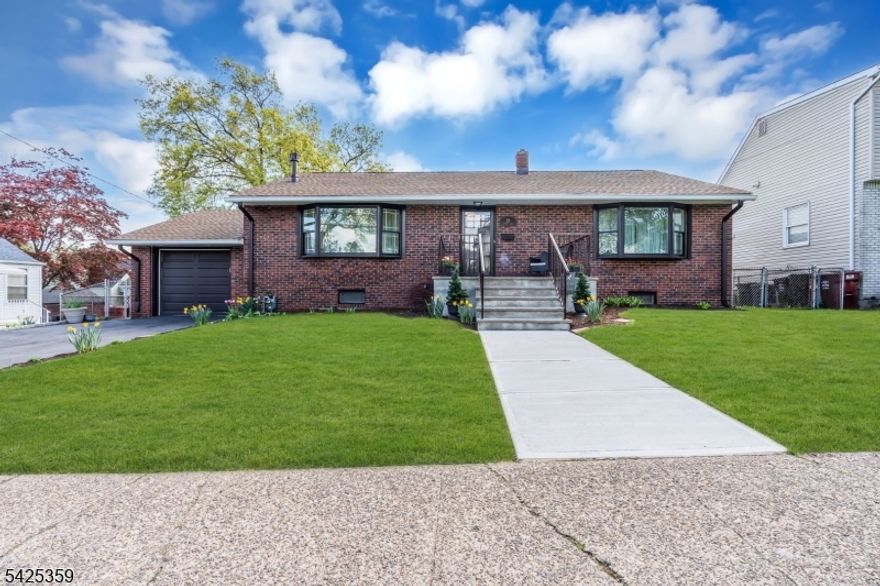 Turnkey Ranch Perfection in Sought-After Nutley - With Room to Grow.  Sun-drenched, move-in ready, and packed with high-end upgrades, this stunning ranch delivers the lifestyle you've been waiting for. Exotic cherry hardwood floors, a gas fireplace, and a custom eat-in kitchen with granite countertops and stainless steel appliances make everyday living feel elevated. Three flexible bedrooms, two full baths, a finished lower level, and a walk-up attic ripe for expansion give you space today and limitless potential tomorrow. Top it off with a brand-new 4-car driveway, EV charging station in the garage, fenced backyard, and easy NYC access, and this one simply checks every box.