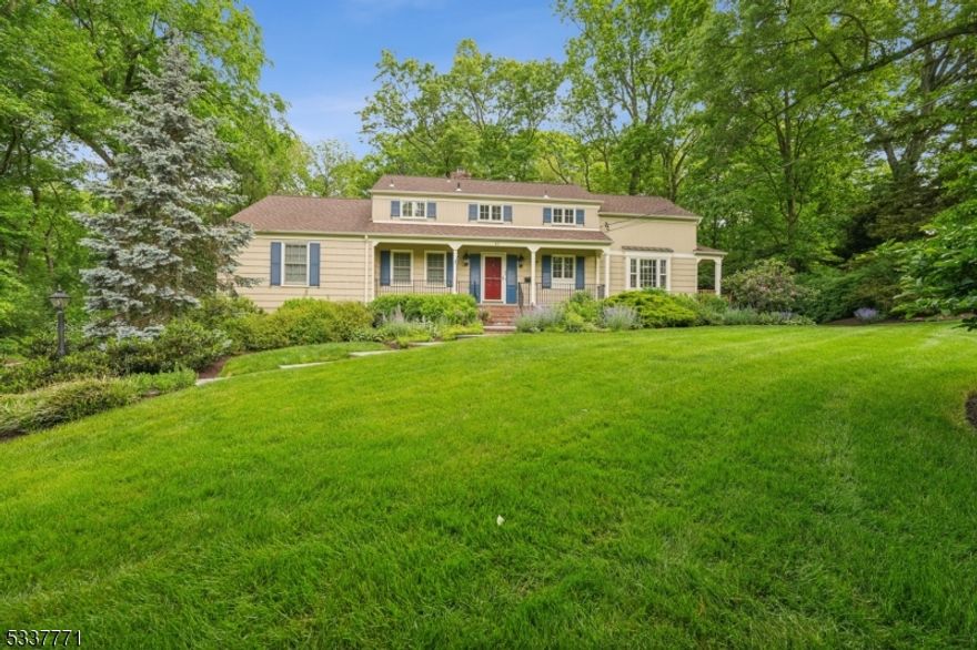 Nestled at the end of a prestigious cul-de-sac on one of Madison's most sought-after streets, this exceptional home offers the perfect blend of privacy, elegance, and modern comfort. Resting on .70 acres of professionally landscaped grounds, this property is unusually large and offers a serene retreat, surrounded by mature trees and a private walking path that meanders through the woods. Inside, the home is thoughtfully designed with abundant storage.  The first-floor primary suite is a private sanctuary, boasting a spa-like bath with a soaking tub, large shower, private water closet, and a spacious walk-in closet. An additional first floor bedroom offers flexibility as a guest suite or home office.The eat-in kitchen is bright and inviting, perfect for everyday living and entertaining. The gracious dining room with its two large french doors, offers unobstructed views of this property's park like setting. The family room with its stately fireplace is a warmth and comfortable room. The second level features three generously sized bedrooms, each with ample closet space, and a well-appointed full bath. The finished, walk-out lower level provides endless possibilities for a recreation room, gym, or media lounge and even includes a potting shed, a dream for gardening enthusiasts.Completing the home is a spacious Ipe deck, blue stone patio with fire pit, and oversized two-car garage, ensuring convenience and storage. This extraordinary property delivers an unparalleled lifestyle..