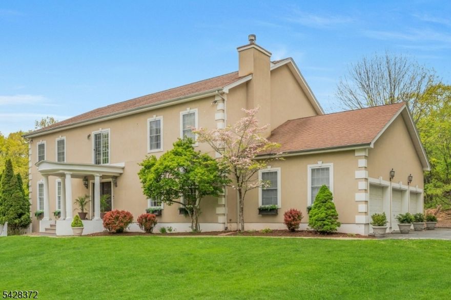 Experience a rare blend of privacy, space, and refined living in this expansive custom-built 6-bedroom, 5.5-bath sanctuary tucked away on a quiet cul-de-sac in sought-after Upper Montclair - just minutes from the NYC direct train. Built in 1996, this exceptional home is designed for both everyday comfort and effortless entertaining. The main level features a spacious living room with fireplace, an elegant dining and family room combination, and a gourmet kitchen with a separate prep kitchen - perfect for hosting. Just beyond, a sun-filled sunroom offers a peaceful retreat for morning coffee or relaxed afternoons, all overlooking the home's serene surroundings. Upstairs, four generously sized bedrooms each feature their own en suite bath, creating a sense of luxury and privacy for everyone. A bright, open sitting area/home office at the top of the stairs adds flexibility for modern living. The ground level introduces a standout feature: a 2-bedroom living space with its own private entrance. Complete with full kitchen, living room, dining area, and full bath, this separate dwelling offers exceptional privacy. Outdoors, the property continues to impress with an in-ground heated pool and an expansive 3-car garage that adds both convenience and distinction. Set within the highly regarded Montclair School District and just minutes from Montclair's vibrant downtown, this home offers the rare combination of complete seclusion and effortless access to all Montclair has to offer!