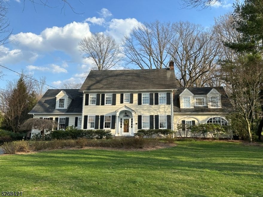 Welcome Home to this stunning one of a kind Chatham colonial in the sought after Upper Washington Avenue neighborhood. The classic, timeless grandeur and stately curb appeal invites you into the home that embraces original architectural details and offers the current conveniences for 2024 living. The first floor boasts high ceilings, there are wood floors in all rooms on the 1st and 2nd floor, as well as front and back staircases. The gourmet kitchen has high-end stainless steel appliances, an island with seating and a built-in banquette dining area. The gas fireplace and custom mantle are the focal point of the living room. The dining room flows to a butler's pantry/wet bar. The family room with custom arched windows is adjacent to a first floor office. Natural light fills the home throughout the day and the well-manicured yard with mature evergreen screening is a private oasis. The rear paver patio offers additional outside living space and flows into the level yard.The 2nd floor has 4 bedrooms, 3 full bathrooms, a study and the laundry. There is a back staircase near a bedroom and bathroom perfect for an au pair or guest suite. The primary suite has a large walk-in closet, an en-suite bathroom with a soaking tub and steam shower. The third floor has a 2nd office and a bedroom.The attached 2 car garage is heated. The basement offers a recreation room, gym, cedar closet and storage/utility rooms. Location! Location! Location! A must see-it will not last.