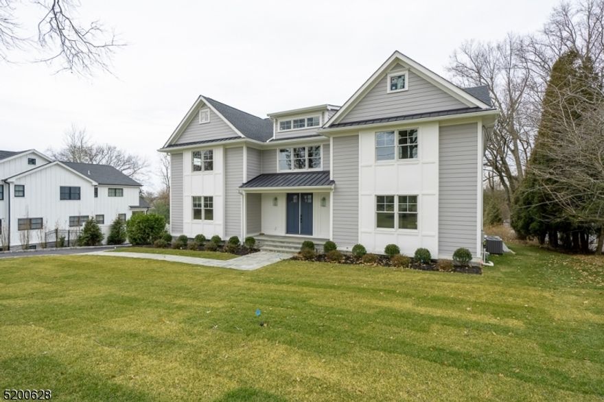 This amazing 6-bedroom 6.1-bathroom top to bottom renovation by local builder J Michael's Properties will take your breath away from the moment you step inside. On a 1/2-acre lot in the heart of the sought after Rolling Hill Section of Chatham this home has approx.7,200sqft laid out across 4 floors. Enter into a grand 2 story foyer and tons of natural light from the Anderson 400 series windows. The 4" hardwood floors throughout and 9ft ceilings on the first floor give this home a grand feel. Custom detailed moldings/casings, recessed LED lighting, and in ceiling speakers for entertaining and attention to detail are just a few of the features that make this home special. The custom gourmet kitchen w/ flush inset handmade cabinetry made in the USA by Great Northern, massive 10' center island, SS Wolf 48inch double oven/range, 42" subzero fridge/freezer & Marvel wine fridge, all with custom quartz countertops, Primary bedroom, bathroom, and WIC will have 11' tray ceilings, quartz/marble vanities, and a massive WIC w/ a library ladder! Spacious, bright bedrooms, a full finished walk-out basement with Rec room, mud room, and space for a home gym/office, and a walkup 3rd floor attic. designer lighting package, Kohler fixtures, prewired for AV/alarm. new utilities and 3 zone HVAC, 30-year HD timberline roof, Hardi Board siding, Azak trim, trex deck and a bluestone walkway and front porch are just a few of the amazing high-end features that complement the quality of this renovation.
