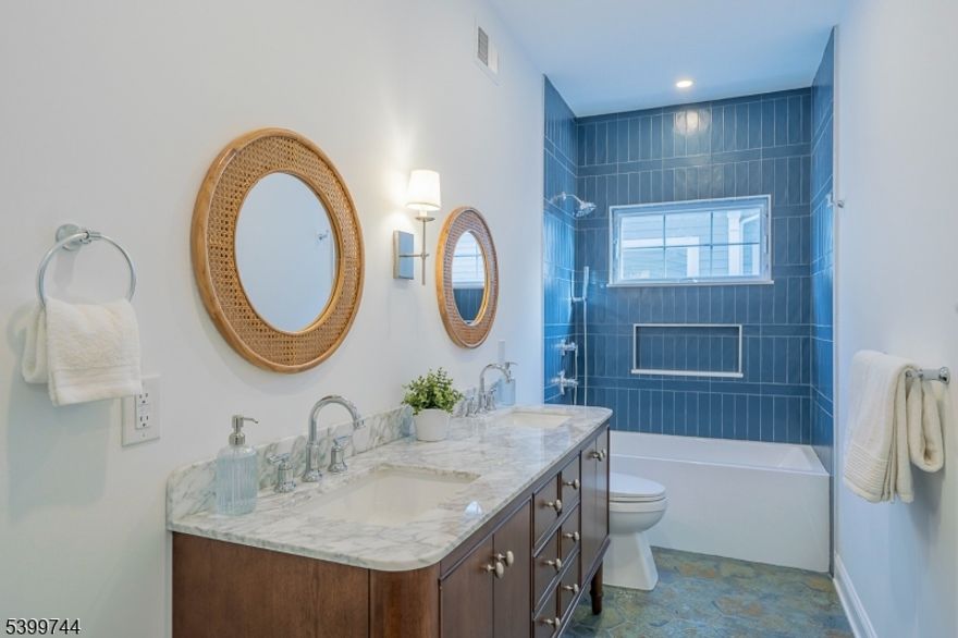 Experience the best of modern living in this exceptional nearly 5,000 sq ft. newly built home, stylishly designed for comfort & modern living. Impeccable design & high-quality craftsmanship by Lefko Brothers, combine in this thoughtfully planned custom Colonial featuring 9' ceilings, oak flooring, curated lighting, detailed millwork & loads of windows offering incredible natural light. Step through the front-to-back center Foyer & into open & sun-drenched rooms that invite gathering & relaxation. The elegant Living & Dining Rms flow into the dream Kitchen, anchored by a spacious center island & top-of-the-line appliances created for the fussiest of chefs!  Adjacent casual Dining area & Family Rm comfortably welcomes all w/ its vaulted ceiling, gas Fireplace & sliding doors to the rear patio & fully fenced yard, the perfect outdoor entertaining venue. 1st Fl. en-suite BR, customized Mudroom w/ access to 2-car Garage & Powder Rm completes this level. Upstairs, the Primary suite becomes your personal sanctuary, featuring a serene Dressing Rm, spa-like Bath, & generous WIC. Two additional BRs, hall Bath & convenient Laundry Rm round out the 2nd Fl. The third Fl, perfect for guests, or a quiet workspace is composed of 2 more BRs, full Bath, WIC & Attic storage. The fully finished Lower Level features an extra-large Recreation Rm w/ built in wet bar, BR w/ full Bath, Gym & Office. Ideally situated only 0.7 m to downtown Maplewood Village & 2 blocks to jitney service to NYC train.