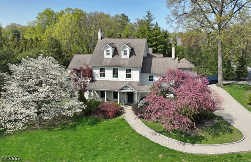 This stunning center hall colonial over 5,500 square feet of living space  located in the heart of the Somerville School district, a one-of-a-kind Ridgewood home. The home has been meticulously renovated by the current owners including the kitchen and primary suite addition. This home maintains the original charm but with a modern floorplan ideal for entertaining. Enter through the gracious center hall and move into the 32 foot long living room, 10' ceilings and large wood-burning fireplace that seamlessly connects to the modern family room, featuring a fireplace. The family room and the bright and inviting sunroom connect to the deck and gourmet outdoor kitchen. The first floor also features a gourmet kitchen with cathedral ceiling, lots of natural light, a private dining area, butler pantry and first floor laundry. The dining room dates back to the 1760?s with the original fireplace. The second floor features four large bedrooms, all with stunning views of the grounds. The primary suite includes high ceilings, two walk-in closets, a primary bathroom and 4th wood-burning fireplace.  There is a  private suite located on the third floor which with bedroom, sitting room and full bath. Ideal for guests, home-office or private retreat. The home sits on three-quarters of an acre with an expansive lawn, inviting outdoor space, two-car garage and private circular driveway off John Street.  Close to all schools Somerville and RHS - 2 blocks)  and NY Transportation.