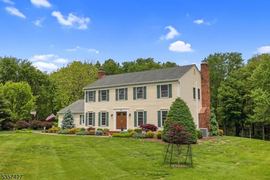 The house you've been waiting for!  Light, bright, modern, updated, well maintained and backs to Green Acres in desirable Bennington Woods area!  Features include 1st floor office, dining room or playroom off kitchen, newer kitchen with huge dining area and 6' brick surround fireplace, stainless appliances, huge center island breakfast bar, quartz countertops, beverage station with refrigerator, pantry, stainless farm sink, family room with wood burning fireplace, 1st floor laundry and garage entrance, updated powder room.  Second floor offers Primary suite with updated full bath, walk-in closet, 3 additional very spacious bedrooms and updated main bath. Finished half basement with mini-split HVAC and storage in other half.  Other highlights include above ground pool with deck surround, hardwood floors throughout, mostly new thermal pane windows, custom closets are outfitted, natural gas, newer hi-efficiency boiler, new front door, bilco doors from basement.  Great commuter location, desirable Tinc Rd elementary school and highly rated Mt. Olive High School.  Seller says city water available in street.