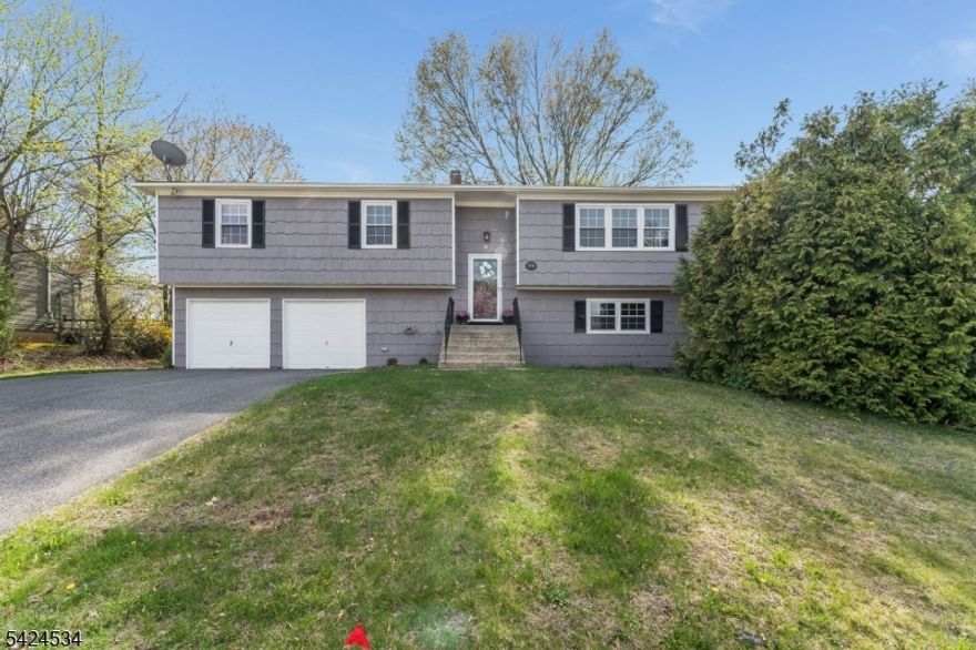 Need a home with SPACIOUS Room Sizes?  Look no further...This is the ONE!  What a Great Opportunity to own a 4 BR, 2.5 Bath Home Nestled on a .34 ACRE Lot within the meandering streets of the "Brakeley Park" Community located in SCENIC and Highly Sought After Lopatcong Twp!  This is your chance to own this 2,300 sq ft single family home! Exterior Freshly Painted-2024! Super cute Entrance Area! Very LARGE & SUN-FILLED Main Level with Living Rm, Dining Rm and Huge Kitchen! Kitchen has all NEWER Appliances & a Double Door Pantry! 3 Generously Sized BR's on Main Level including the PRIMARY w/Private En-suite Bath & 2 Closets! LL hosts a Family Rm w/sliders to yard, a Half Bath, a Large 4th BR, Storage Closet, Laundry/Utility Rm w/backdoor & Interior access to the OVERSIZED 2 Car Garage w/Opener! Wonderful .34 Acre Yard with BRICK Patio! Mature Trees! C/A! Newer Furnace! Public Water/Sewer! Sidewalks & Streetlamps throughout the Neighborhood! Just MINUTES to COMMUTER Rts, Schools, Twp PARK, Golf Courses and Most CONVENIENCES! Just needs some updating but with some Paint, New Flooring and your own personal touch, you can transform this large home into your very own! Get Ready to Pack! You can finally Say..."Honey, We are HOME!" Being Sold "AS-IS"