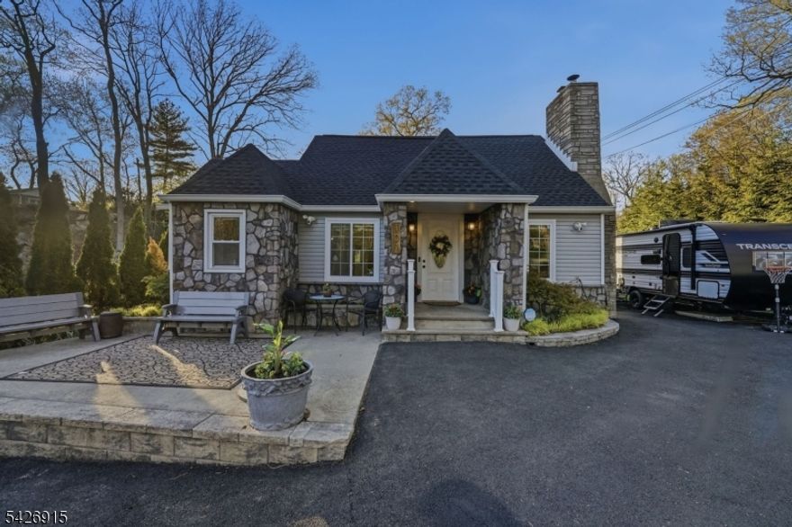 Welcome to this charming Cape Cod-style home just moments from Lake Hopatcong. This 2-bedroom, 2-bathroom home offers a warm and inviting layout, perfect for both year-round living and weekend getaways.The kitchen features beautiful slate flooring, adding character and durability, while the primary suite is filled with natural light thanks to skylights in both the bedroom and bathroom creating a bright, airy retreat.Step outside to your own private backyard, ideal for relaxing or entertaining. Enjoy all the benefits of lake living with access to two community docks equipped with grills, kayaks, and resident dock space.Located within walking distance to the lake, this home offers the perfect combination of comfort, charm, and lifestyle.