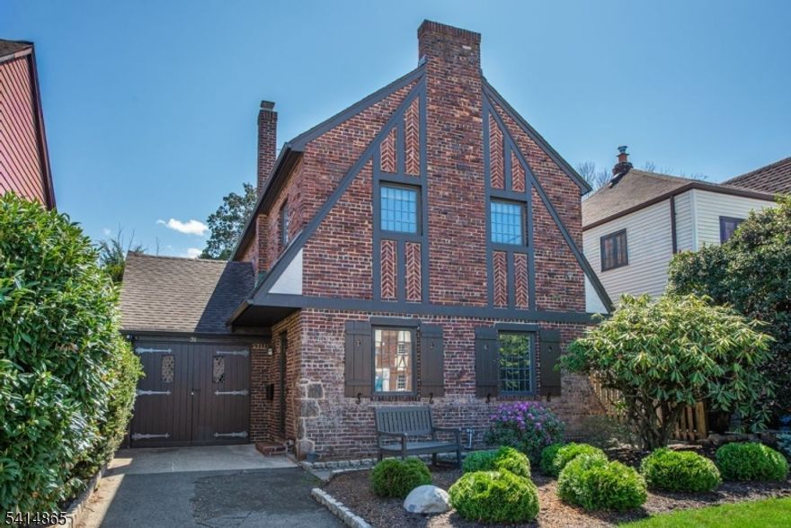 Situated on one of the prettiest streets in the Allwood section is this charming brick Tudor with amazing curb appeal!  Step inside and you will immediately be impressed with the spacious living room, with a beamed ceiling and floor to ceiling custom built-in bookcases that flank the front door. Continue through the arched doorway to the formal dining room leading to the updated eat-in kitchen, with wood cabinets, granite counters and stainless steel appliances (kitchen table with matching granite surface is included.) Beyond the kitchen is a raised screened porch --the perfect place to relax as you overlook the private, flat, fully fenced yard. On the 2nd floor, you will find 3 bedrooms (2 of which have cedar closets) plus an updated full bath. The lower level offers a finished section which is the perfect rec room. In addition, there is a powder room, a utility room/storage room/laundry room plus several storage closets. Beautiful hardwood floors & leaded replacement windows throughout. Brand new furnace & electric box! One car garage also has storage space. Windsor Road is a dead end street with access to four bus routes at the end of the block, all that take the commuter directly to NYC!  At the other end of the block is a neighborhood playground. This street is perfectly located just a short walk to restaurants & shops on Allwood Rd, Market St & the Styertowne shopping area. The Allwood Park & Ride and Rte 3 are both a short distance away!  Great house! Great location!