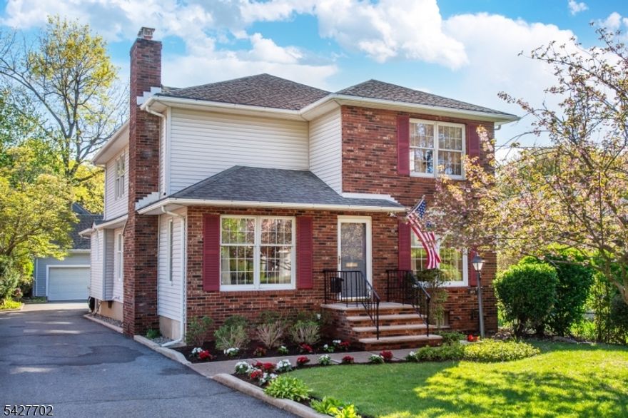 Welcome to this spacious (2500+sqft) & inviting center hall Colonial in the heart of Rutherford, NJ. A welcoming entry foyer sets the tone for this beautifully maintained home, featuring a formal LR with a cozy gas FP & an elegant formal DR perfect for entertaining.The modern eat-in kitchen is designed to impress, showcasing sleek quartz countertops, classic subway tile backsplash, & SS appliances. The 1st FL also offers a generously sized BR with a walk-in closet, a newer full bath, & a versatile den ideal as a home office, guest room, or potential additional BR.Upstairs, you'll find 3 generously sized BR's, all with ample closet space, along with a 4th room being used for storage that can easily be converted into an additional BR or flex space to suit your needs.Throughout the home, brand new HW floors add warmth & continuity. Comfort is key with Central AC on the 1st Fl & wall units on the 2nd Fl.The large, partially finished basement spans the full footprint of the home, offering endless possibilities for recreation, storage, or additional living space.Outside, a long driveway leads to a 2-car det. garage complete with an impressive loft perfect for a home office, game room, studio, or creative retreat.Perfectly situated, this home provides easy access to NYC transportation & is just moments from Rutherford's vibrant downtown, known for its charming shops & acclaimed restaurants. A wonderful opportunity to enjoy space, style & convenience all in one location.