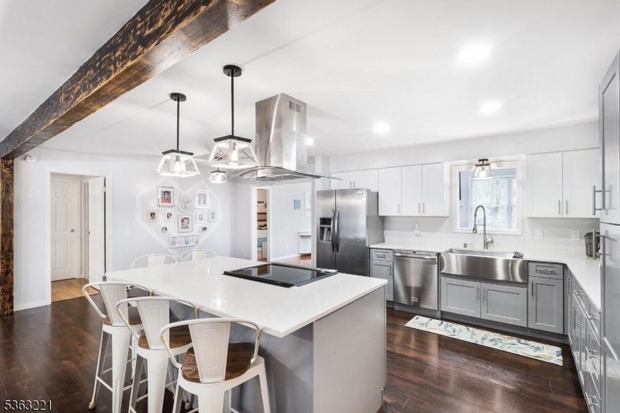 Welcome to your serene escape at Kemah lake, in Hampton Twp NJ! This stunning property boasts 5 bedrooms, and 3 full baths, along with a family rec room and office space, perfect for both work and play. Also, has a guest room, playroom and a workshop. The farmhouse kitchen opens up to a spacious great room, flowing out to deck and backyard ideal for entertaining guests or just relaxing. Situated on 1.72 acres of lush land, you'll enjoy the tranqulity and everything this beautiful lake community has to offer, make this your dream home. New septic was installed 4 years ago, many updates too, you dont want to miss out on this little piece of paradise.