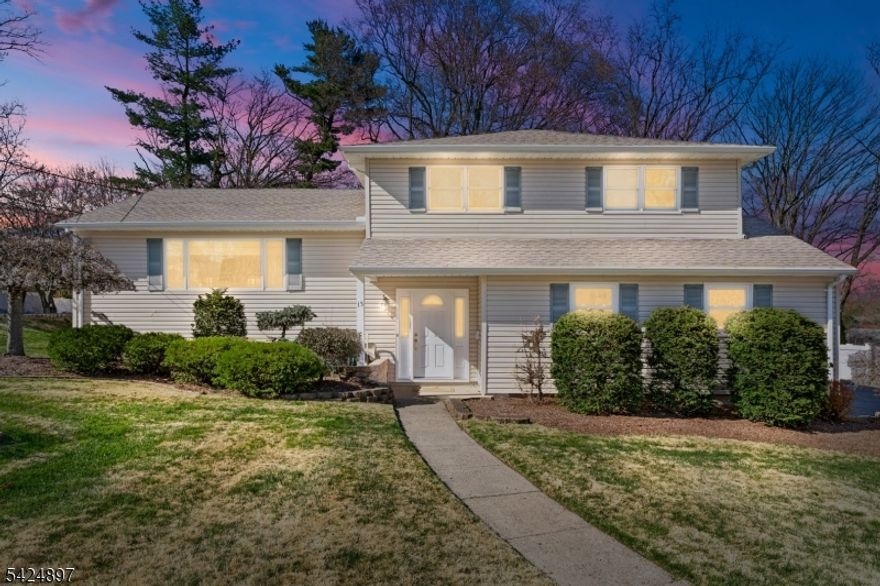 Welcome to this meticulously maintained and beautifully appointed home in a highly desirable section of Wayne. This stunning residence offers the perfect blend of comfort, style, and functionality. The main level features a thoughtfully designed layout, highlighted by a formal dining room perfectly situated for entertaining. The kitchen comes equipped with stainless steel appliances and flows seamlessly into an oversized, sun filled family room. Throughout the home, elegant crown molding adds a refined, upscale touch. Featuring 3 spacious bedrooms and 2.5 bathrooms, the home includes a primary suite with a private en-suite bath. The fully finished basement is a standout feature, boasting high ceilings and providing significant additional living space .Enjoy effortless indoor outdoor living with a walk out from the lower level leading to your private oasis. The spacious, fenced in backyard offers exceptional privacy and features a beautifully designed paver patio, ideal for outdoor gatherings. Additional highlights include a two car garage and a long driveway providing ample parking. This home offers the perfect combination of elegance and space in a sought after location. Don't miss this exceptional opportunity!