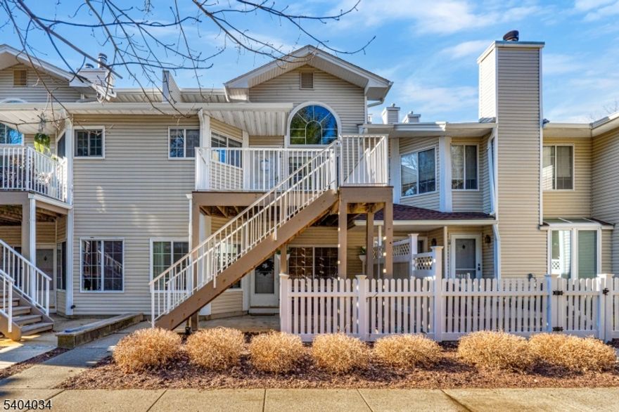 Welcome to this gorgeous D Model, updated multi-level townhome in the highly desirable Crestmont Hills community. This second- and third-level home offers modern finishes, thoughtful design, and effortless living. Freshly painted throughout, the home features all new flooring and a bright, open layout perfect for today's lifestyle. The beautifully remodeled kitchen is a showstopper with stainless steel appliances, stunning countertops, and classic subway tile backsplash, offering seamless flow to the dining area ideal for entertaining. The sun-drenched living room boasts a cozy fireplace and an impressive wall of windows that fills the space with natural light. This level also includes a generously sized bedroom and a full updated bath, perfect for guests or flexible living. The upper level offers a versatile loft and office area, leading through double doors to the expansive primary suite featuring vaulted ceilings, abundant closet space, an in-unit washer and dryer, and a luxurious, fully renovated spa-like bath with double vanity and a stunning glass-enclosed shower. Additional highlights include direct access to the garage and resort-style amenities such as clubhouse, pool, tennis courts, and playground. A true turnkey home in a prime location just unpack and enjoy!