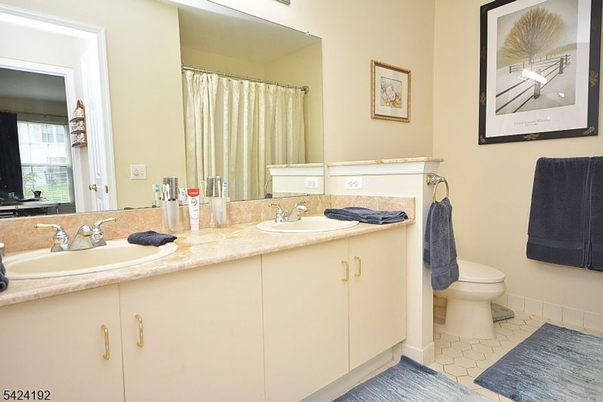 Beautifully maintained End Unit by original owner in desirable Spring Ridge.  This 2 Bedroom 1 Bath Condo features an updated Kitchen with newer appliances, granite counter tops and butch block table (stools included).  The open Living room and dining area is perfect for entertaining. Sliding glass doors from living room to private patio overlooking the open area.  Master bedroom features a walk-in closet. The Second bedroom being used as an office has a full wall closet. Entry area with guest closet.  Full size washer and dryer in unit. Mirage flooring in living room, dining room, kitchen and foyer plus tinted windows for privacy.  Newer roof plus 5 year old Furnace and Air Conditioner.  Enjoy the excellent community amenities, pool, tennis courts, club house and playground. Ideal location near major highways  and shopping.