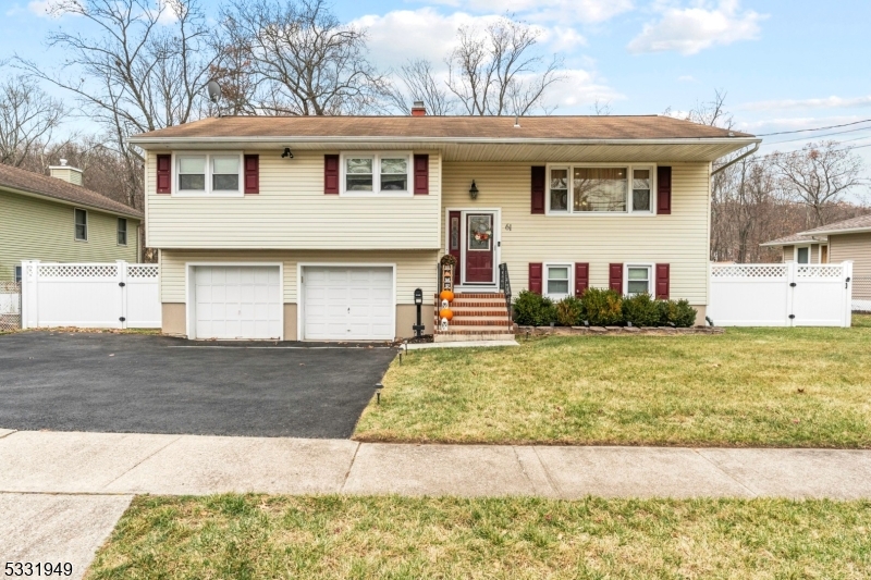 Rare opportunity to own a newly renovated bilevel in a highly desirable neighborhood! Located minutes away from Oakwood Lake, schools, and parks, this updated home features a stunning NEW kitchen boasting a wine fridge, farmhouse sink, stainless steel appliances, deep cabinets and drawers, quart counter and bar, and even a pot filler for your culinary convenience! Hardwood floors, recessed lights, and updated baths.  The in-ground pool with young liner gets plenty of sunlight.  The woodburning stove heats up the house.  You will be impressed!