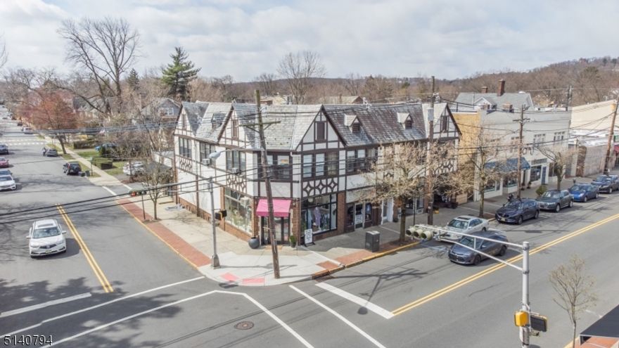 Rare opportunity to purchase beloved landmark Watchung Plaza Tudor mix-use building which has been family owned since 1971. Set in the heart of Montclair, Watchung Plaza is surrounded by a desirable residential neighborhood and features unique shops and restaurants with high volume foot traffic. A mid-town direct train station to Penn Station and lovely gazebo for DeCamp bus stop with service to Port Authority are nearby. The accessibility, charm and popularity of this area results in stable tenants and low vacancy for both residential and retail units. Municipal lot located behind building. Great retail tenants include Well-Founded Barbershop, Dot Reeder Boutique, Bob Fraser Locksmith, Yarnia, Oro Hair Salon and Raven Color Studio. Three 2BR apartments above. 3 dedicated parking spots.