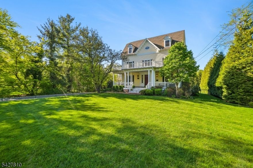 ENJOY THE EASE OF AN IN-TOWN LIFESTYLE, STEPS FROM DOWNTOWN SHOPPING, DINING, AND THE SUMMIT TRAIN STATION. Classic Architecture Meets Modern Comfort In This Beautifully Preserved 5 Bedroom, 3.1 Baths Early 1900s Home. Prepare To Be Impressed, This Residence Delivers Space, Style, And Enduring Appeal. A Gracious Foyer, Featuring Striking Wood-Planked Ceilings And Rich Hardwood Floors That Bring Depth And Distinction. The Main Level Is Thoughtfully Designed For Both Everyday Living And Entertaining, With A Seamless Flow Between Rooms including A Newly Customized Study Showcasing Coffered Ceilings, Custom Shelving + Built-in Bar. AT THE HEART OF THE HOME, THE KITCHEN IS DESIGNED TO GATHER AND IMPRESS, WITH HIGH-END SS APPLIANCES, MARBLE COUNTERTOPS, NEW CUSTOM PANTRY & ISLAND SEATING. OPENS EFFORTLESSLY TO A LIGHT-FILLED GREAT ROOM BOASTING VAULTED CEILINGS, EXPANSIVE WINDOWS, NEW FIREPL, CUSTOM BUILT-INS & WOODEN ACCENT WALL. The Second & Third Floors Offer Five Generously Sized Bedrooms, Including A Serene Primary Suite With A Private Sitting Area, Balcony Access, Ensuite Bath, Soaking Tub, And 2 Walk-In Closets. Additional Space Includes, 3rd Level Media Room + Finished Basement w/Game Room. Nicely Manicured Landscaping Frame A WELCOMING FRONT PORCH AND BACK DECK, IDEAL FOR OUTDOOR ENJOYMENT.  Additional Highlights: Whole-House Generator, Humidifier and Electric Gate & More. This Home Offers The Perfect Blend Of Charm, Comfort And Convenience, A Must See!