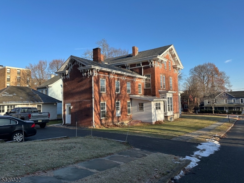 Spacious rental with soaring ceilings and stunning natural light! Restored hardwood floors, marble fireplaces, basement, and detached 2 car garage for this unit.  This inviting apartment offers a bright, airy ambiance, perfect for comfortable living.  HEAT INCLUDED.  tenant pays electric  and water.