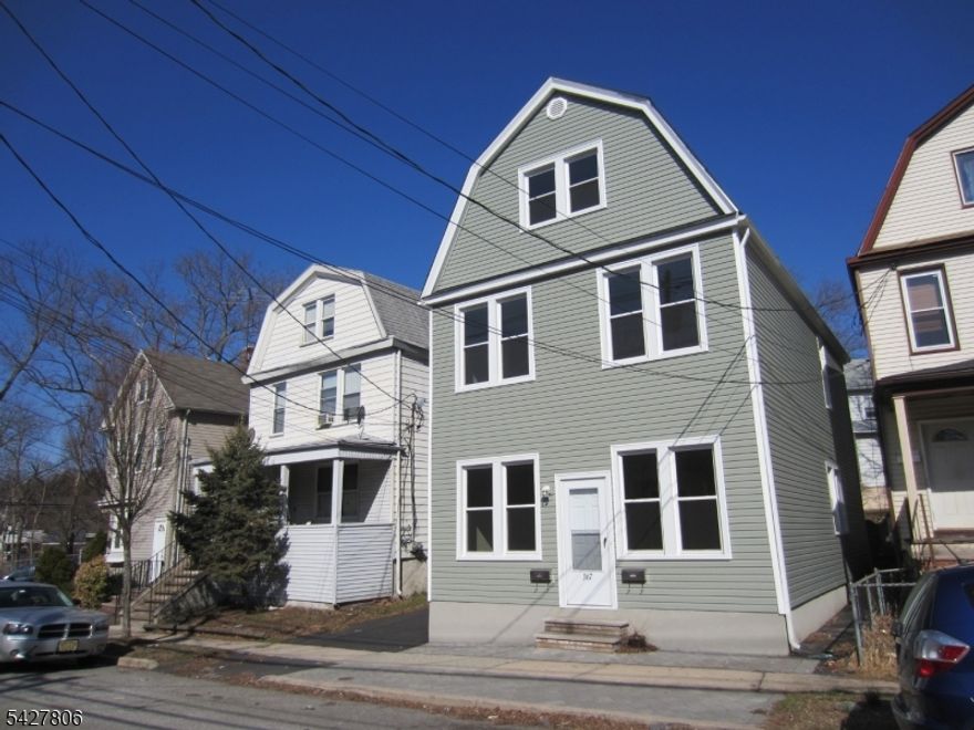 You don't want to miss this one! Fabulous opportunity for investors or owner occupants to own this well-maintained multi-family home close to downtown, Brookside Park, NYC transportation and GS Parkway. First floor consists of bedroom, office or 2nd bedroom, eat it kitchen, living room and bath. Second floor is two levels & offers large eat in kitchen, oversized living room with an abundance of natural light, bedroom & bathroom and upper level has 3 bedrooms & large loft area with door to back staircase. Ample closet space. The basement is shared with a washer/dryer. All separate utilities. Home has its own driveway plus a 2-car detached garage. Short drive to Montclair State University & Bloomfield College of Montclair State University! Pictures were taken before tenants moved in.