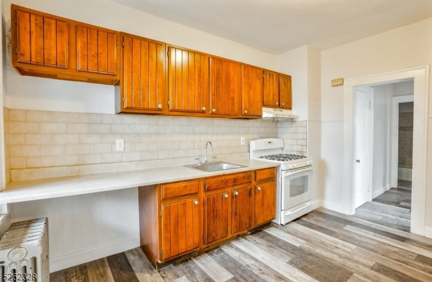 Second floor apt in a multi family house, renovated and ready to move in. Ample living room, kitchen, 2 bedrooms and one full bath. Parking for one car in parking lot shared. No pets. Income verification, employment verification and credit check a must. A Few blocks from train station with direct access to NY Penn.