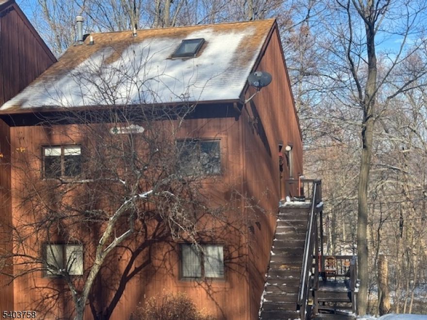 3BR, 2BA multi-level end unit in Great Gorge, second-floor slope-side location. First level features panoramic window with abundant natural light, 2 bedrooms, main bath, living/dining combo, galley kitchen, washer/dryer, and sliders to private deck with mountain views and sunsets. Hardwood and marble floors throughout. Second level offers loft-style bedroom and full bath. Steps to skiing, golf, and Minerals Spa. Near hiking, pools, fishing, snowboarding, and the Appalachian Trail. Approx. 50 miles to NYC. Ideal for year-round living or weekend getaway.