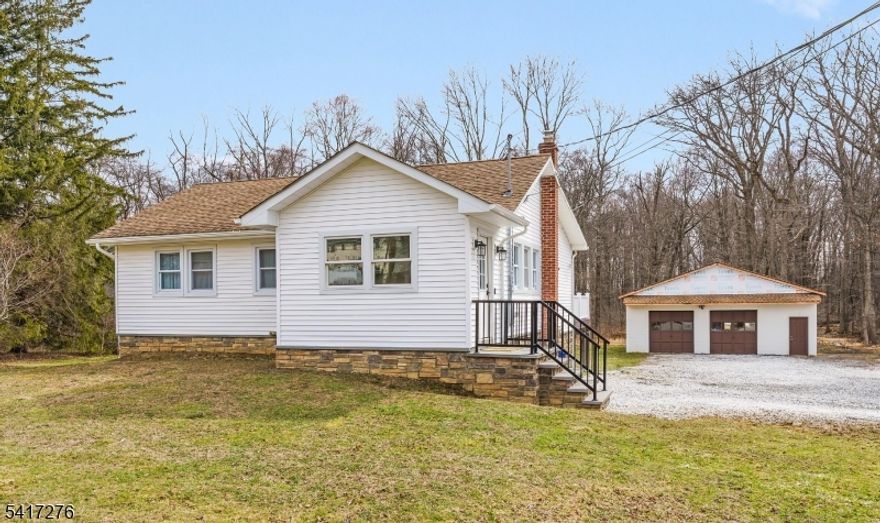 Beautifully renovated ranch set on 1.7 acres of expansive, level property in highly sought-after Randolph Twp., offering a rare combination of privacy, space, and refined updates. A newly constructed foyer with a custom entry armoire welcomes you home, providing both style and practical storage. Inside, hardwood floors throughout the main level, recessed lighting, & abundant natural light create an inviting open-concept living space designed for both comfort + entertaining. The beautifully appointed kitchen flows seamlessly into the living area and features a center island, granite countertops, stainless steel appliances, generous cabinetry, and a spacious dining nook perfect for casual dining or hosting guests. The primary bedroom offers 2 closets, while the home includes a full bath on each level for added convenience + functionality. The finished basement significantly expands the living space with a rec room, additional bonus room ideal for a home office, gym, or guest space, and ample storage. Step outside to enjoy the expansive deck and flat, usable property, offering privacy and endless possibilities for outdoor living, recreation, or future enhancements. Major updates provide peace of mind, including a septic system only 5 yrs old and central air installed 4 years ago. Ideally located close to Randolph's top-rated schools, shopping, dining, parks, & commuter routes, this move-in ready home offers an exceptional blend of modern comfort, property size + prime location.