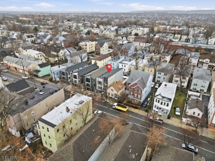 589 So 18th Street  is the coronation of what started as a multi-year real estate redevelopment project. This spectacular three-story James Hardie and brick facade is making its grand entrance in the spring market with a splash. The ground level features a built-in garage, a game room, full bathroom and bedroom. The first floor features an open floor concept, an ensuite bedroom ,a full bathroom and two more bedrooms. The kitchen is adorned will all new stainless steel appliances and recess lighting. the second floor unit has three bedrooms, a laundry room, two full bathrooms, an open floor concept and many more amenities. The ground up multi family enjoys a  proximity to school, park and house of prayer.