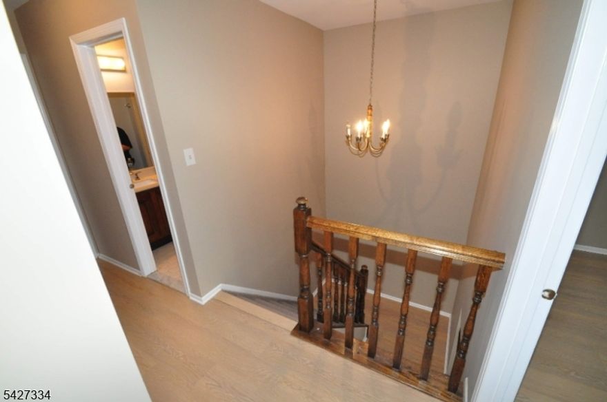 Sought after gated community -The Pointe at Galloping Hill -St. Andrew Model 3 bedrooms, 2 1/2 baths Townhouse -End Unit. 24 Gated Security, In-ground seasonal pool with clubhouse. Welcome to this beautifully renovated townhome with a wood burning fire place in the spacious living room. Kitchen is updated having SS appliances with a extended breakfast bar opening into a comfortable den with sliding doors entering the patio. Wood floors throughout downstairs and upstairs. Washer/Dryer and 1/2 bath on first floor. Second floor offers a Master ensuite with expansive closet space along with two more bedrooms and second full bath. Ready for summer with central air and association pool to enjoy. Commuter's dream! -NYC direct bus right outside of association, minutes to Union train station and easy asscess to most major highways.School buses enter into association for pick up and drop-off. No dogs allowed/cats only.