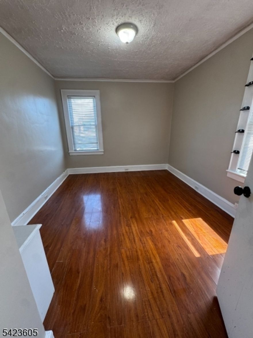 Welcome to this unique and beautifully designed 3-bedroom, 2-bath loft-style apartment located in the desirable Upper Roseville section of Newark's North Side. This spacious unit features high ceilings, an open-concept layout, and modern finishes throughout, creating the perfect blend of style and comfort. Enjoy generous bedroom sizes, ample natural light, and a layout ideal for both relaxing and entertaining. Conveniently located near major highways, public transportation, shopping, and local amenities, making commuting a breeze. A rare find that offers both character and convenience don't miss the opportunity to make this stunning space your next home!