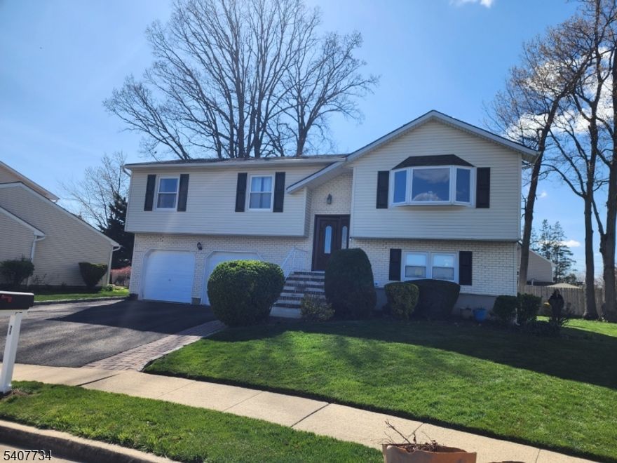 Beautifully upgraded to modern look in cozy setting, a Bilevel One Family home in most convenient location of the Edison Township. Just minutes away from Metuchen and Metropark Train Stations. Within minutes to Rte 1, 27, 287, GSP and NJ Tpk. 20 minutes to Newark Airport. Amazon headquarter, Costco, Walmart, Samsclus and all auto dealerships within minutes. Good size of Bedrooms, Kitchen equipped with high grade stainless steel appliances, bathrooms are carefully designed and upgraded. Main bath with dual sink. Upgraded shower bathtub. Hardwood floors on Dinning, Living rooms and foyer while bedrooms with warm and cozy neutral high fiber carpets. Living room with Bay window for lot of lighting. Lower level with one large bedroom attached to open family room and full bath. Family room with double door that opens onto the large brick patio.  AC, Furnace and Water heater are less than 3 year old.