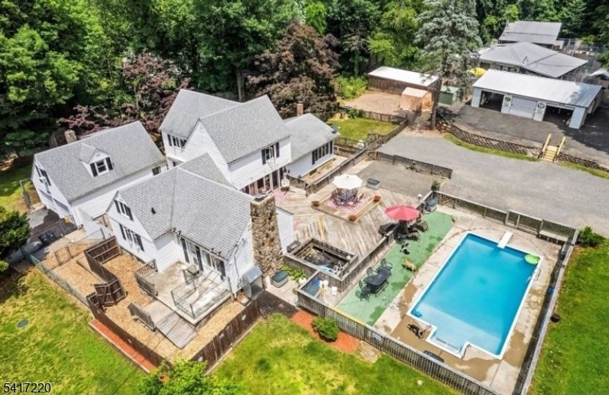 Sprawling home on 5+ acres with incredible potential, offered at $799,000. This unique property features a 4 bedroom, 3 full bath home set on a fully fenced 5.4 acre lot. Ideal for dog lovers or entrepreneurs looking to live and work in one location, the property includes kennel buildings with indoor and outdoor runs including 43 crates including 3 in quarrentine area, grooming area, half bath, , 7 outdoor runs with 11 larger runs attached, 13 indoor kennels with 7 outdoor attached yards. one large play area, and an equipment barn plus several sheds. Plenty of space to own and operate your own kennel, boarding, or training facility.  Separate gated entrance and large parking area. The home offers generous living space  and possible mother  daughter. Property being sold strictly as-is, presenting a great opportunity to add value and create your vision.