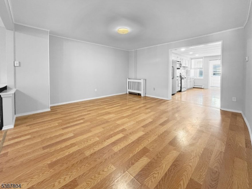 Welcome to 204 Mercer Street   a spacious and inviting 3-bedroom, 1.5-bath Colonial-style Row House in the heart of Phillipsburg. The oversized kitchen offers plenty of counter space and cabinet storage, making meal prep and entertaining a breeze. Flowing right into the open-concept dining and living areas, the main level is perfect for everyday living and gatherings. Upstairs, you'll find three generously sized bedrooms and a full bath, while the walk-up attic provides bonus space for an office, studio, or extra storage. Step outside to enjoy your open front porch, ideal for morning coffee, or head out back to the fenced yard space with a 1-car detached garage accessible from Cherry Ln. Located close to major commuter routes and shopping, this home offers everything you need in one smart package.