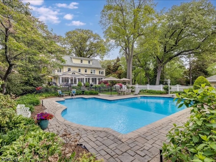 Nestled on one of the most coveted blocks in Boonton, this well appointed Classic center hall colonial presents the epitome of sophistication, elegance and historical grandeur. Offering nearly an acre of lush, meticulous landscape and tranquil privacy, gift wrapped in Landscaping - groomed lawns, Japanese maple, english ivy, rose bushes, & a Koi Pond. This awe inspiring 4200 square foot home is designed for the discerning with gracious living & entertaining spaces inside & out, multiple outdoor areas with a paver patio, bluestone walkways, & an in-ground heated pool to name a few. Grand Living Inspires Elegance Through Traditional Design, but has all the Modern Conveniences. Restored & renovated with integrity in 2011.. This expansive 5 bedroom, 5 bath estate has many impressive elements. Formal living & dining rooms, a premium chef's kitchen with high ceilings & walls of windows, butler's pantry & sun parlor. Upstairs, 3 bedrooms & 2 baths which includes the generous primary suite with sitting room, walk-in closet & bath along with another two bedrooms & bath on the third level. The full walkout basement offers more finished space and another full bath. Come experience tranquility, luxury & privacy right in your own backyard w/all the conveniences of NYC mass transit, easy access to major hwys, shopping & dining. Close proximity to Grace Lord Park, Boonton's Main Street and Mountain Lake Blvd.