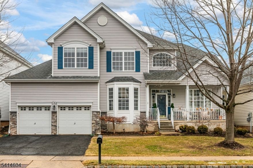 In beloved Carriage Gate, this beautifully presented Villa-style Preakness model welcomes you with natural light and thoughtful design at every turn. It begins with a covered front porch while inside large windows brighten the interior from front to back. The formal living and dining rooms are positioned at the front.The family room offers a gathering space anchored by a pretty mantel and a gas fireplace. A half wall provides some separation from the breakfast room, while keeping the layout connected. The kitchen brings the charm of a French country house to life. Cheerfully colored cabinetry adds personality, while a gas range stands ready for everything. Above it, is a powerful Broan Elite hood that vents outside. Gorgeous quartz countertops provide both beauty and durability. A pantry closet keeps essentials organized, and the large adjoining mud and laundry room opens directly to the two-car garage. Near the foyer, the powder room has been updated with an eye-catching pedestal sink, while outside, the walled patio is an inviting space for relaxed evenings. Upstairs, the primary suite is oversized, with a sitting area, massive closets with closet organization systems to keep things neat, and a refreshed en suite spa bath.The finished basement expands the home's footprint and includes a full bath that is especially convenient when guests stay for the weekend. Carriage Gate is a well-loved community that includes a clubhouse, pool, playgrounds, tennins court & sidewalks.