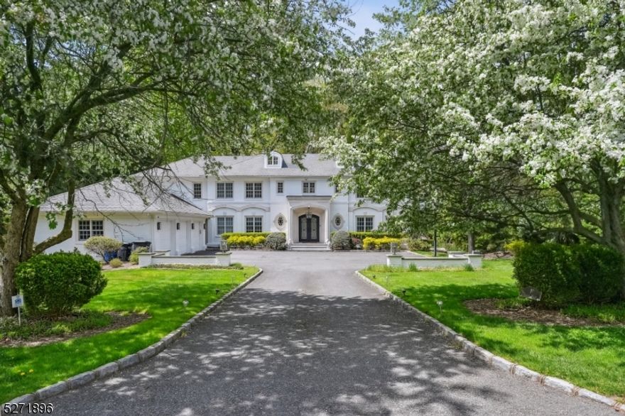 Spectacular custom built all-brick Center Hall Colonial on .98 acre of beautiful property designed by David Rosen, AIA & built by Vanco construction to the highest specifications w/ ideal floor plan, rooms of generous proportion & amenities including state of the art home theater & stunning pool surrounded by lush landscaping on private, totally level property. Ideally located, walking distance to highly rated Glenwood Elementary (0.2 miles), Arboretum (0.3 miles), & SH Train Station (0.5 miles). Stunning new gourmet eat-in kitchen w/ quartz countertops, high end Dacor cooktop, SubZero refrigerator & freezer, & 2 dishwashers, totally open to great room w/15'6" cathedral ceiling w/ exposed beam. Sunlit breakfast room & French doors that lead to maintenance free deck, patio & pool w/ new mechanicals. French doors overlooking the pool & gorgeous patio open to balcony. Massive dining room, totally open to living room, perfect for entertaining 50+! 1st level features a bright office w/ built-ins, laundry room, & mudroom w/ easy access to 3-car garage. 2nd level has luxurious Primary suite w/ huge custom WIC & new spa-like bath w/ soaking tub & massive shower, +4 more bedrooms, 2 more new baths & 2nd laundry. Lower Level features a huge rec room, fully equipped new gym, state of the art home theater, 2 bedrooms & 2 full baths. In 2023 - owner upgraded security & WiFi, completely re-landscaped, & added 4 new HVAC units, 2 new hot water heaters, 2 new sump pumps, 2 new ejector pumps.