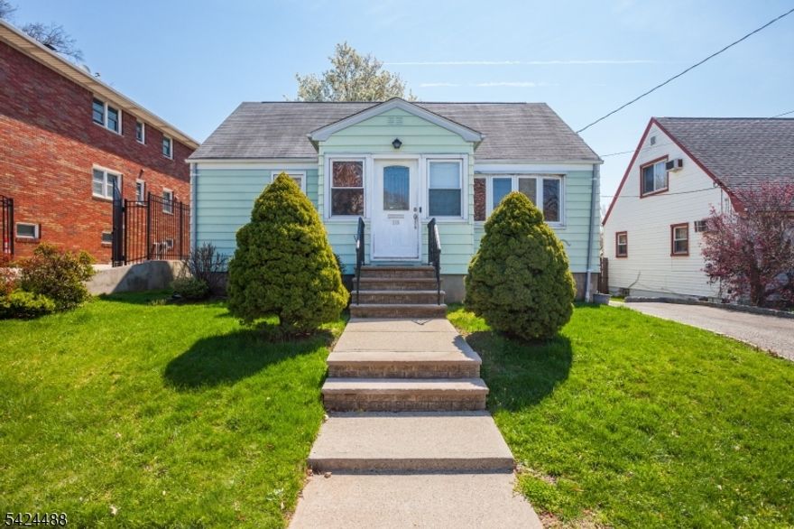 If you're searching for a home that feels solid, sun drenched, and perfectly maintained, this is a must see. The experience begins with excellent curb appeal highlighted by a manicured front lawn and a bright enclosed porch that's practically begging for a pair of chairs and a morning coffee.  Inside, the living room is anchored by rich hardwood floors and a massive front window that floods the space with natural light. The kitchen is a true standout, featuring sleek granite countertops, stainless steel appliances, and a breakfast bar designed for quick bites or socializing while you cook.  The layout offers great versatility, comfortable bedrooms with ample closet space are located on the main level, while the upstairs serves as a private retreat perfect for a quiet primary bedroom or home office. Need more room? The full basement provides expansive storage but has the footprint to easily become a finished space. The beautiful backyard is a blank canvas for summer BBQs and gardening. Perfectly situated for commuters near local shops and major transit, this home is ready for its next chapter!