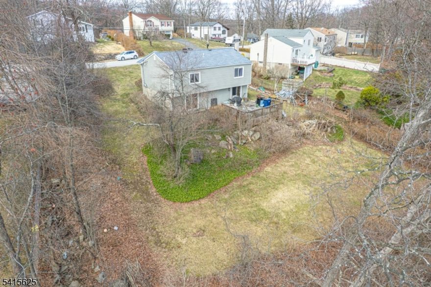 Location, Location, Location! Listed on the first day of spring, this Sunset Ridge home offers the perfect opportunity to be settled in by the first day of summer or sooner. Sunset Ridge is a small community within Barry Lakes featuring NO HOA fees & the convenience of public water. This property includes a 3-bedroom septic, plus a flexible lower-level "in-law suite with a "4th bedroom" and walk-out to the deck. Enjoy year-round recreation with nearby hiking, fishing, local wineries, and your own private deck for relaxing outdoors. Winter activities are just minutes away at Mountain Creek, and the shops and restaurants of Warwick, NY are close by. A fantastic opportunity to enjoy comfort, convenience, and an active lifestyle.