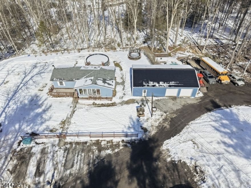 COUNTRY LIVING AT ITS FINEST in this Exceptional Ranch Estate offering a MASSIVE Heated Pole Barn ideal for any Motor Head, Craftsman, Machinist or Hobbyist situated at the end of a Cul-De-Sec on nearly 3 Acres of seclusion, privacy & beauty. Upon entry you are greeted by Soaring Vaulted Ceilings accented by Buttressed Wooden Beams, an Eat-In Kitchen highlighted by a Breakfast Bar with butcher-block Countertops & Stainless Steel Appliances, 3 spacious Bedrooms, and a large Living Room with slider door access to your very own private Deck and Above Ground Pool. The Finished Basement features a BONUS ROOM currently being used as a Fourth Bedroom including a Full Bathroom & Walk-In Closet. Enjoy a GIGANTIC Compound Estate property perfect for year round living or a weekend getaway. Within walking distance to Stokes State Forest and within 10 minutes to the Delaware River & Flat Brook River. The Neighborhood also offers a private Lake, a Playground & Basketball Court. Come make this One-Of-A-Kind Estate property yours before someone else does!